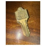 Brass key shape note clip