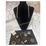 Group of costume jewelry- pendants, brooches,