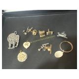 Pendants, cufflinks, sterling silver key ring,