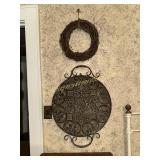Metal art wall hanger and grapevine wreaths