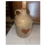 Stoneware corn whiskey jug with painted heart