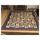 Hand stitched flying geese pattern quilt- border