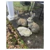 Group of concrete rabbits