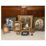 Framed vintage photos and needlework