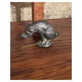 1930s cast metal naughty dog novelty toy for