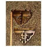 Pair of oak carved wall shelves