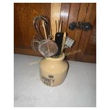 Honey pot with rustic kitchen utensils