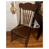 Oak pressed back rocking chair