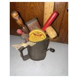 Vintage tins, kitchen utensils in sifter