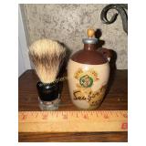 Vintage menï¿½s cologne bottle and shaving brush