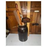 Primitive wooden kitchen tools in brown stoneware