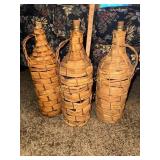 3 vintage wicker wrapped demijohn bottles