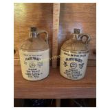 2 small stoneware corn whiskey jugs