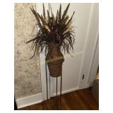 Rattan vase arrangement in metal stand