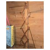 Accordion style hat rack