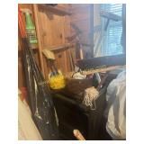 Trash can shop broom and garden tools