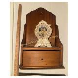 Wooden wall shelf and small frame