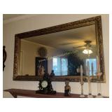 Ornate gold tone wall mirror