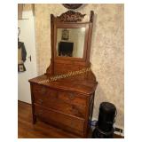 Antique oak dresser and carved mirror