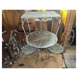 Wrought iron patio cafe style table and chairs