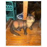 Porcelain sea otter figurine