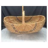 Primitive hand woven farm gathering/egg basket