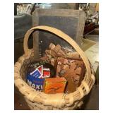 Split oak basket with wooden art, match books and