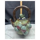 Pottery teapot with fruit and frog
