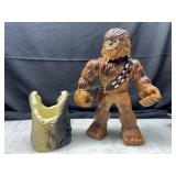 Chewbacca toy and fish koozie