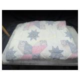 Hand made star pattern quilt