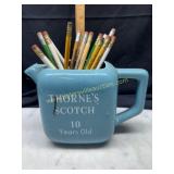 Advertising pencils in scotch pitcher