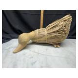 Hand carved wood and reed duck