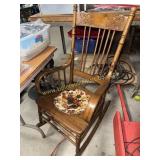 Oak pressed back rocking chair