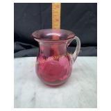 Small cranberry pitcher with applied handle
