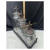Fleur de lis canisters in metal tray