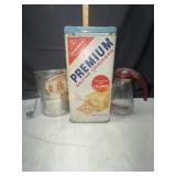 Vintage premium cracker tin, sifter and syrup