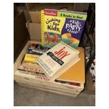 Crate of cookbooks
