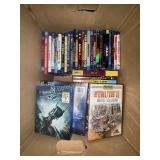 Box of DVDs and PS4 games