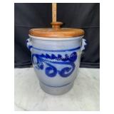 Stoneware salt glazed crock with ears and wood