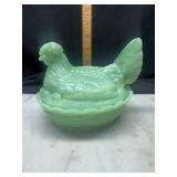 Jadeite hen on nest