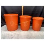 Set of vintage orange servalier canisters