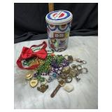 Beads and jewelry in M&Ms tin