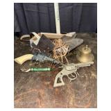 Toy guns and holsters, service bell, bottle
