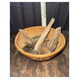 Basket with petrified wood and rock