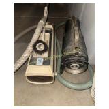 2 vintage canister vacuum cleaners