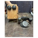 Antique telephone set with wooden box and hand