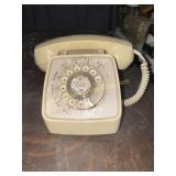 Vintage beige rotary telephone