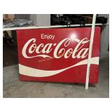 Metal Coca-Cola sign with bracket