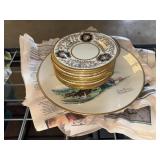 Saucers and Norman Rockwell collector plates