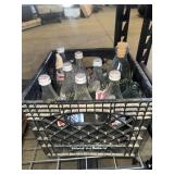 Crate of mostly soda bottles